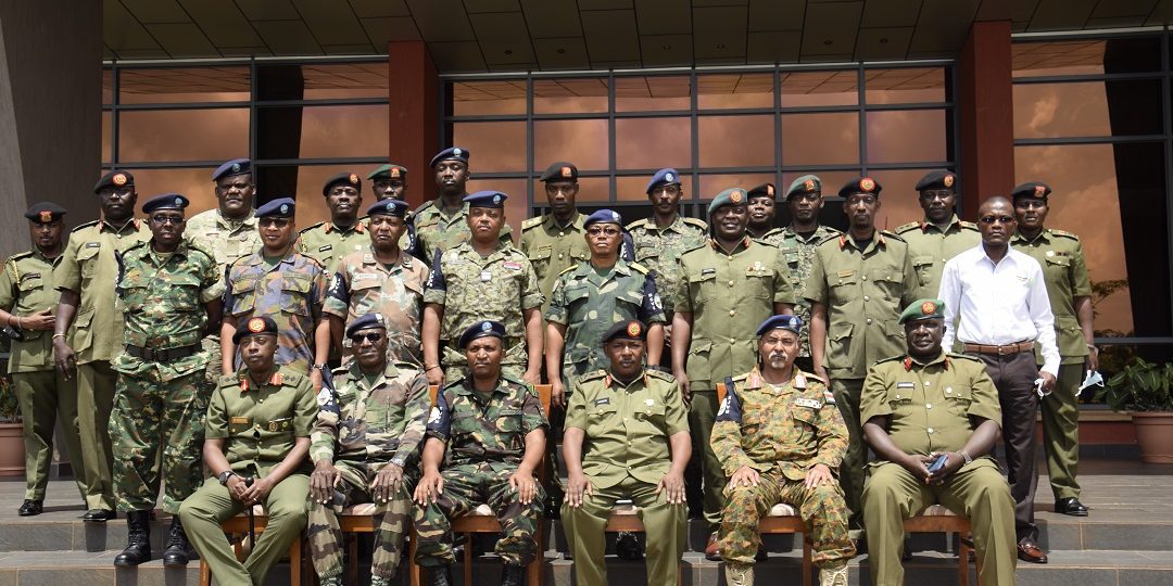Brig Gen Abdul Rugumayo, Maj Elias Daniel Bukulu (From Tanzania) in a group photo with UPDF officers and the Expanded Joint Verification Mechanism Delegation