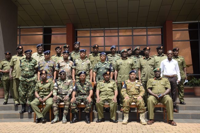 Brig Gen Abdul Rugumayo, Maj Elias Daniel Bukulu (From Tanzania) in a group photo with UPDF officers and the Expanded Joint Verification Mechanism Delegation