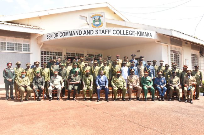 Guest of Honor Hon Jacob Oboth Oboth in a group photo with, Directing Staff and intake 17 graduands at Kimaka after the completion of course at Senior Command and Staff College on 30 June 2022