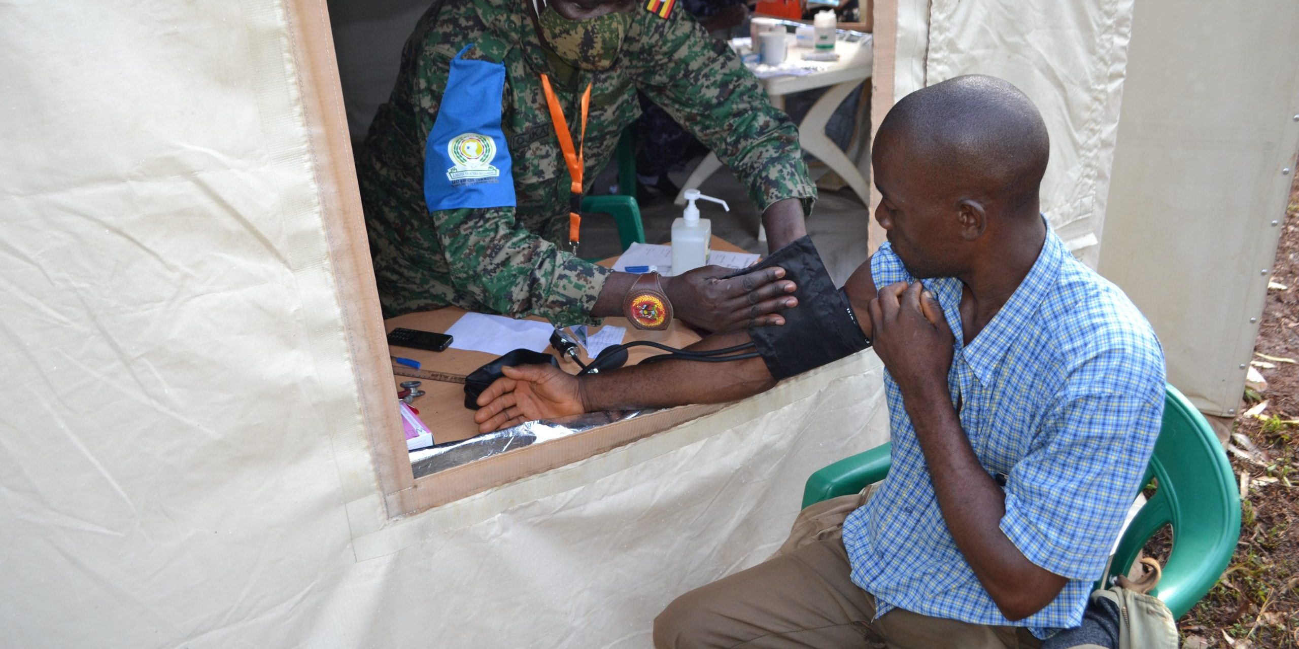 Locals receiving medical treatment as part of CIMIC