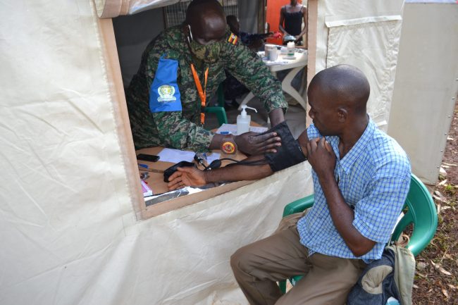 Locals receiving medical treatment as part of CIMIC