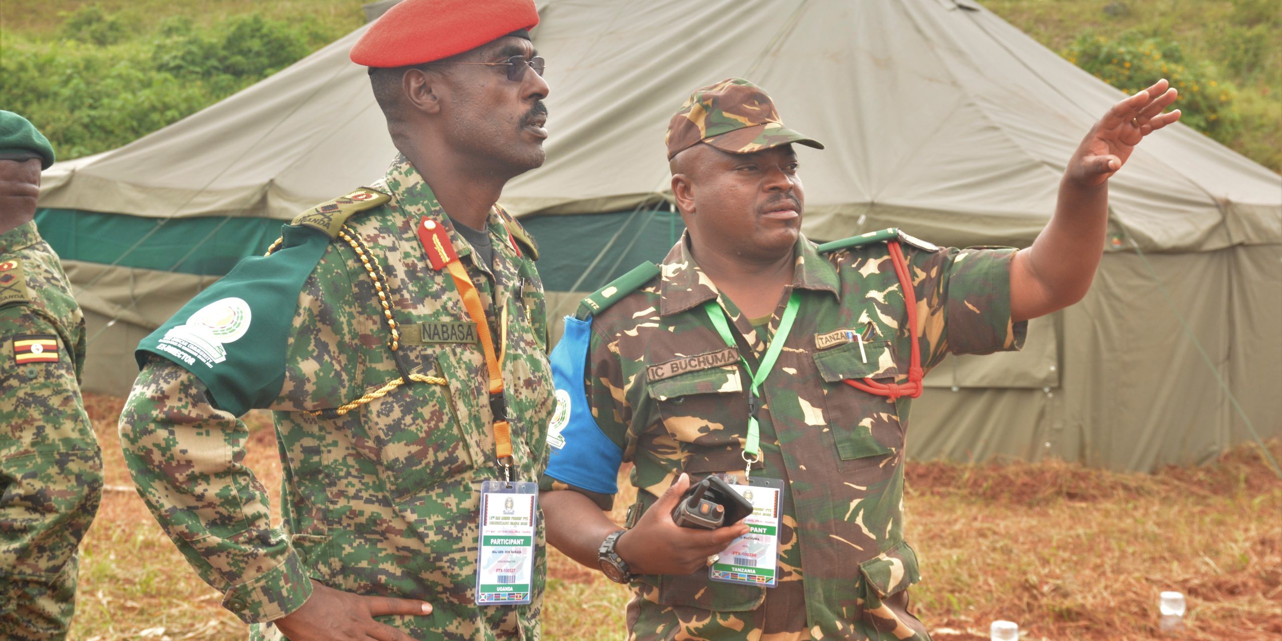Maj Gen Don Nabasa the exercise director being oriented by Maj IC Buchuma the second in command of the Tanzanian contingent