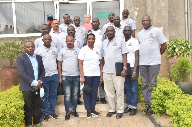 NDC South-Western team in a group photograph with Pearl Dairy Farm Ltd staff on 20 June 2022