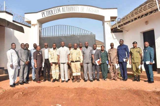 NDC-Uganda course members in a group photo with staff of Petroleum Authority of Uganda on 22 June 2022.