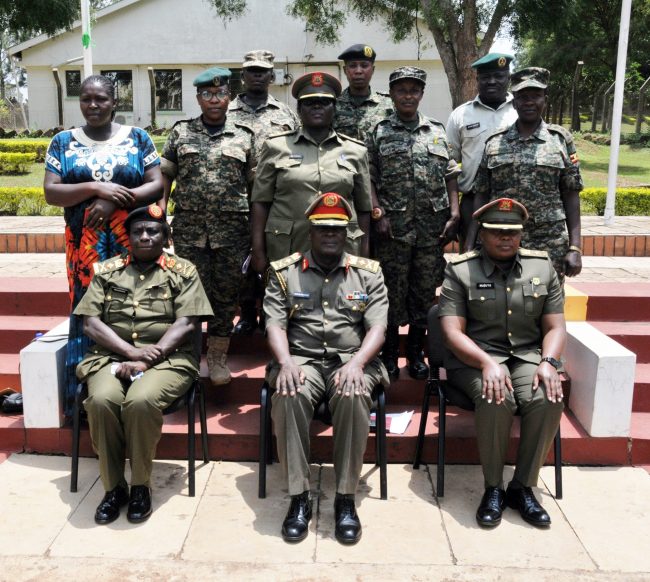 Brig Gen Ssebugwawo (C) in a group photo with officers and men who attended the ceremony