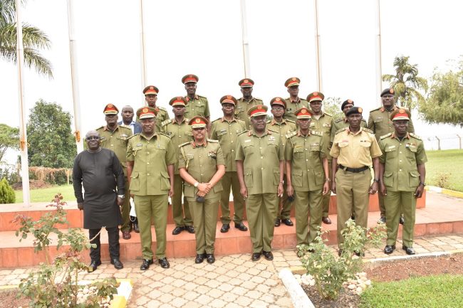 Maj Gen Leopold Kyanda in agroup photo with some of the incoming and outgoing Defence Advisors