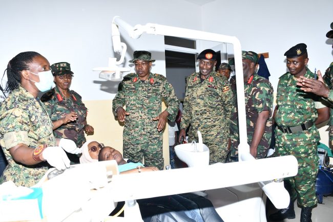 TPDF Chief CIMIC Brig Gen AM Katua (second left ) and EAC Defence Liaison officers visit UPDF medical camp at Mpandae LV Hospital in Zanzibar