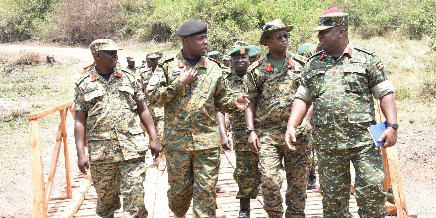 Brig Joseph Semwanga and other UPDF Senior officers inspect a bridge constructed by UPDF Field Engineers_transcpr