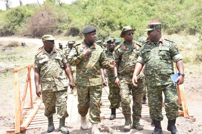 Brig Joseph Semwanga and other UPDF Senior officers inspect a bridge constructed by UPDF Field Engineers_transcpr