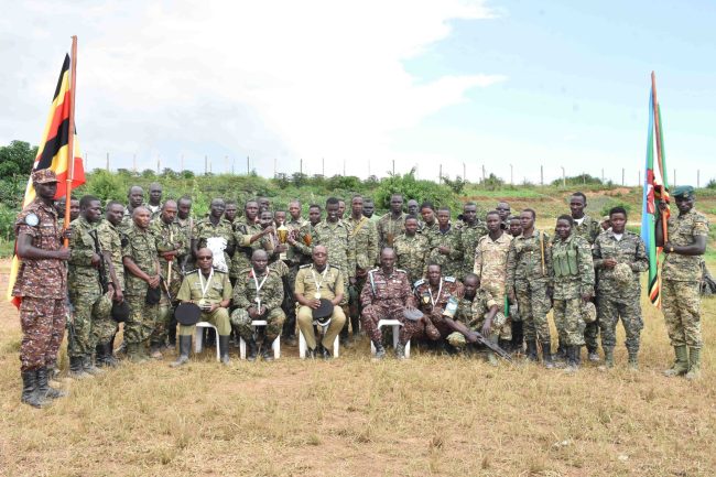 A group photo of UPDF Rangers with the guests_transcpr