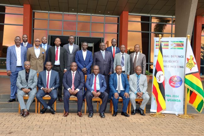A Group photo of UPDF Officers and The Zimbabwe delegation at MoDVA HQs Mbuya