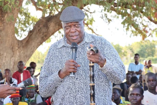 Cabinet Minister for Karamoja affairs Hon Lokeris Peter addressing Karamoja Joint security, Karamoja leadership and Kotido locals