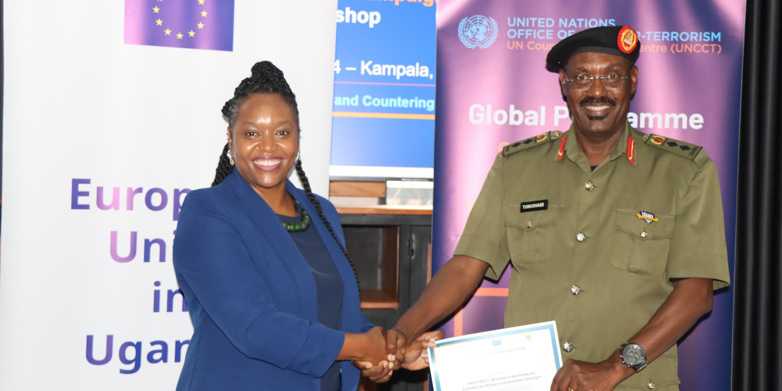 Col Alex Tumushabe being a warded a certificate of Complition by Ms Sylivia Kabaki Acting Head of UN office of Counter Terrorrism-Nairobi