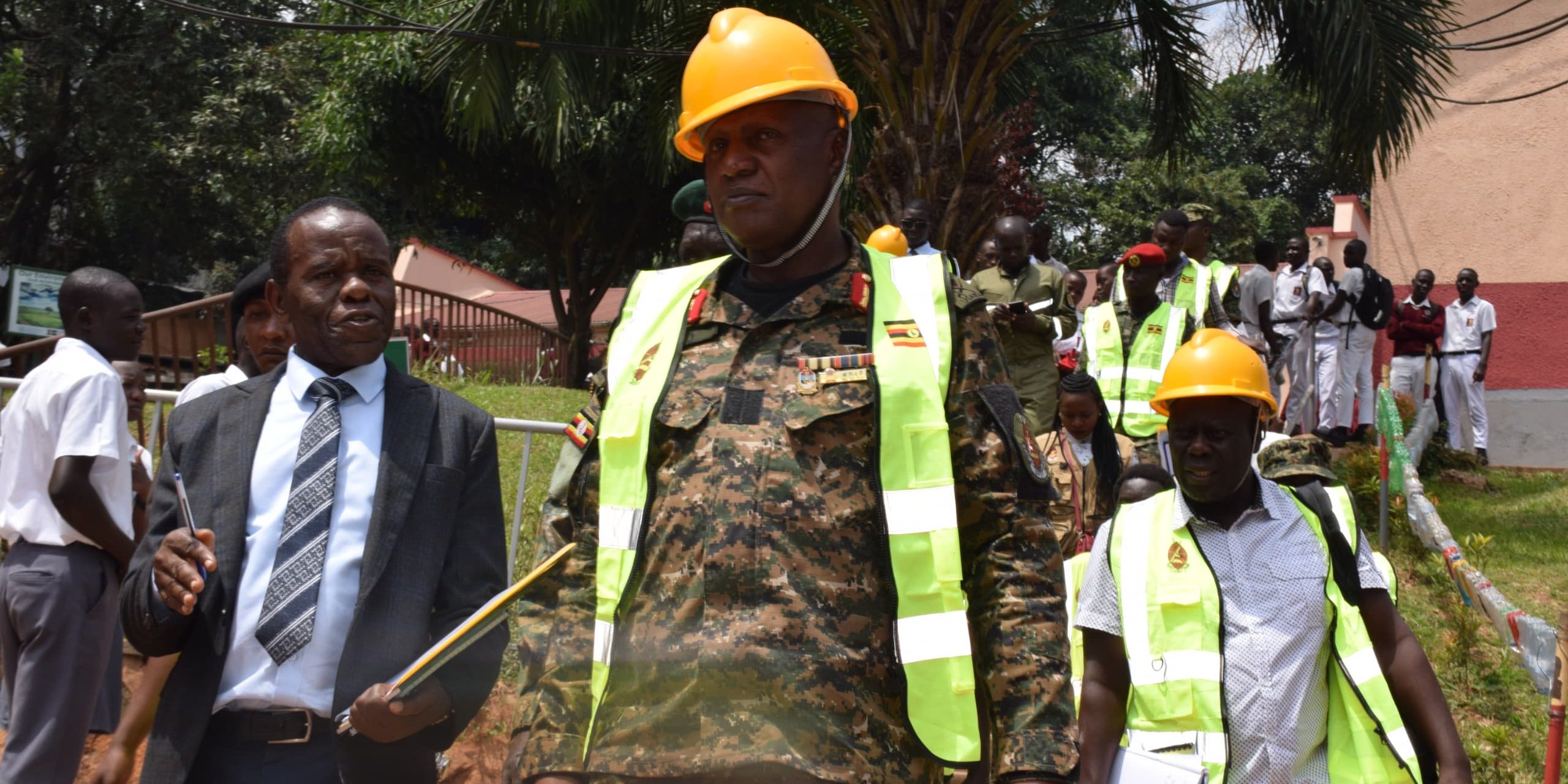 HEADMASTER KOLOLO SS TALKING TO MAJ GEN HENRY MASIKO LEADING THE EVALUATION TEAM FROM UPDF TO ASSES THE ENGINEERS PROJECTS AT KOLOLO SS ON 20 SEPT 24