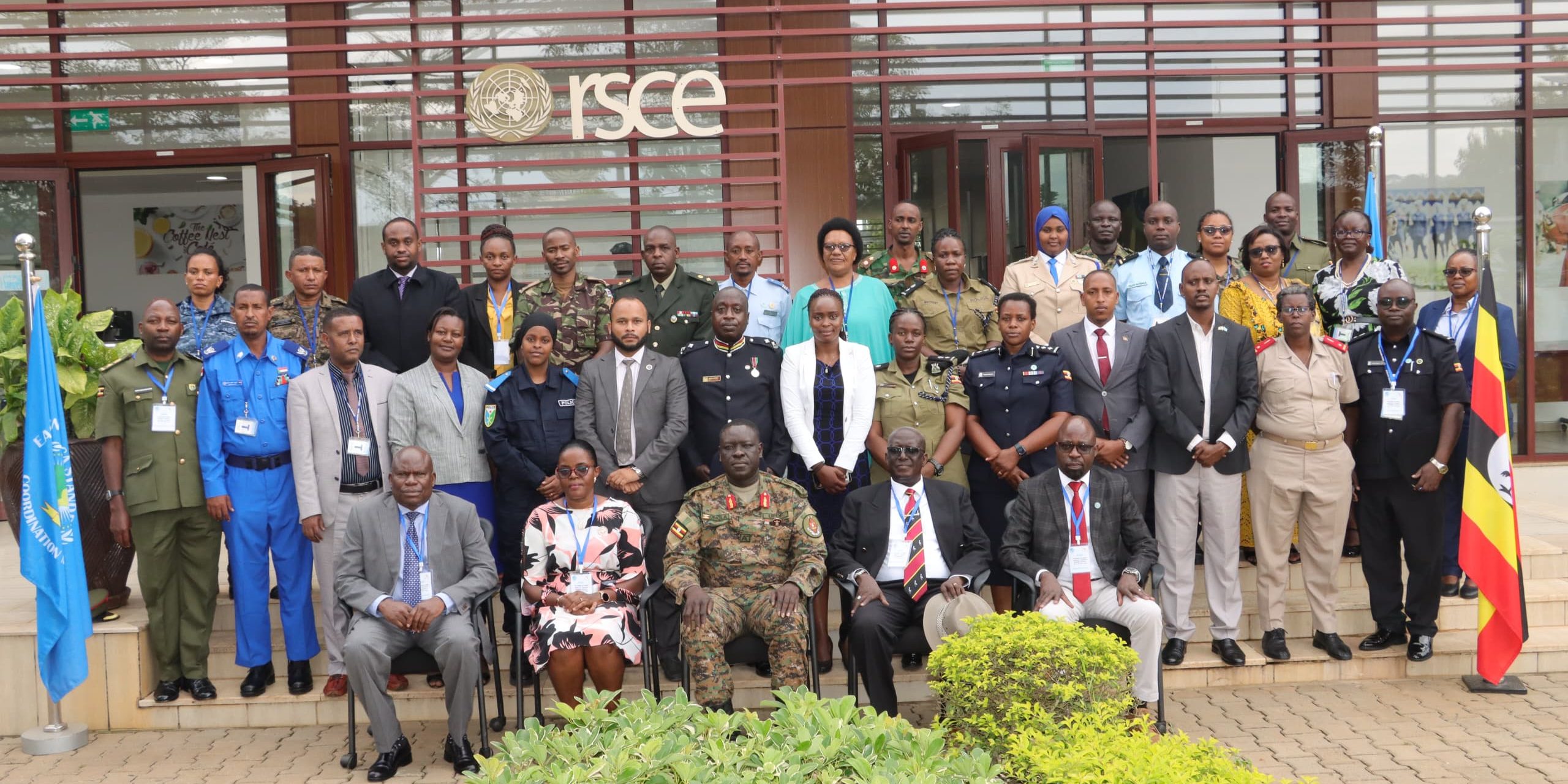 Brig Gen Peter G Omola(C) in agroup photo with course participants