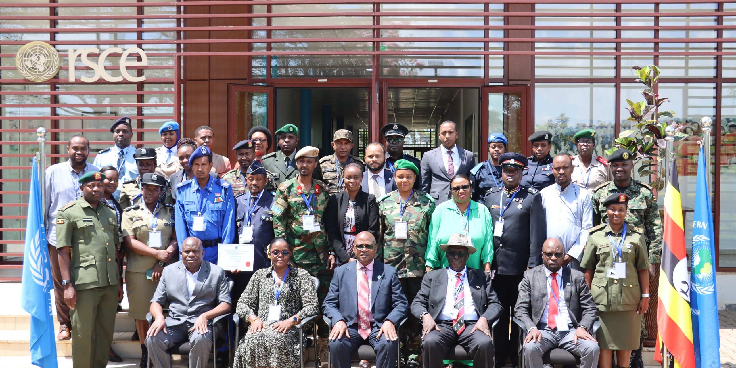 Brig Gen Stephen Kashure (C)in agroup photo with course participants