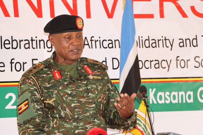 Maj Gen Henry Masiko Joint staff Political Commissar addressing the media