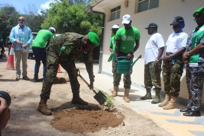 LT. GEN SAM KAVUMA, FORCE COMND PLANTING A TREE