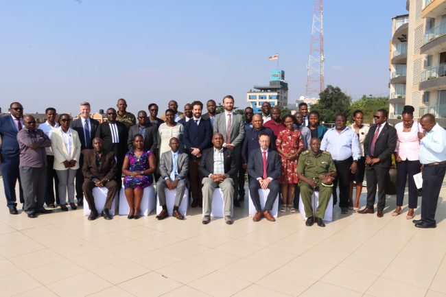 Mr Irumba Roger Kaija(4L),Mr Daniel Feakes (3R) in a group photo with the BWC participants