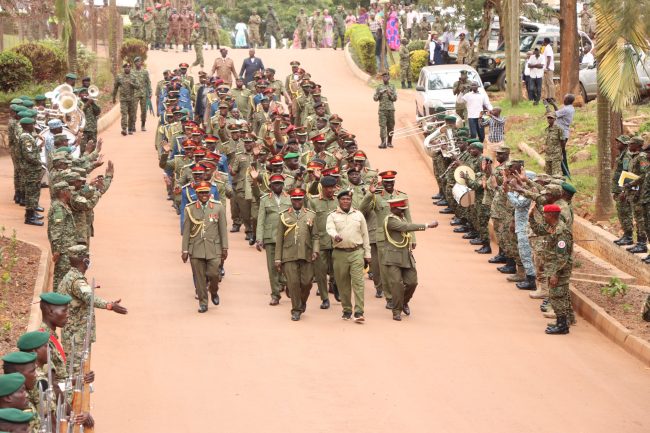 Retirees move out from the MoDVA hq Mbuya while waving as a sign of leaving the active service (2)