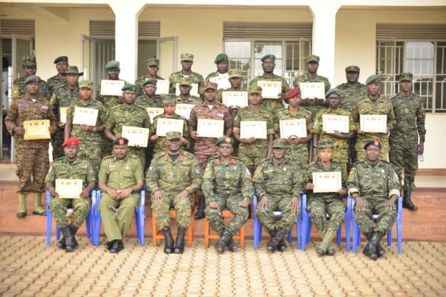 A group photo of TOT with Brig Gen Paddy Ankunda and the leadership of LTC