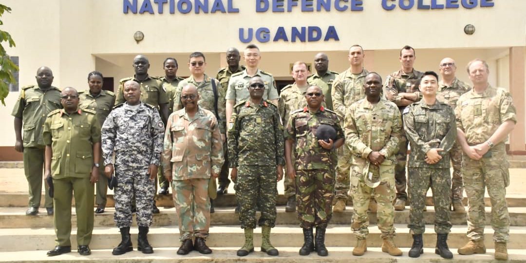 A group photo of Defence Attacheas with the leadership of National Defence College Uganda