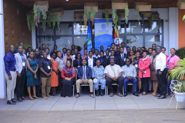 COS UPDAF Brig Gen David Gonyi (C) in a group photo with EASF secretariat and workshop participants