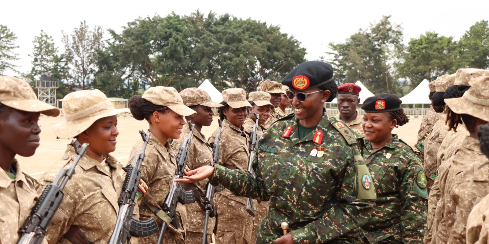 Brig Gen Charity Bainababo Director Women Affairs UPDF interacts with UWA parade participants during rehearsals at Kololo Ceremonial Grounds on Tuesday..JPG