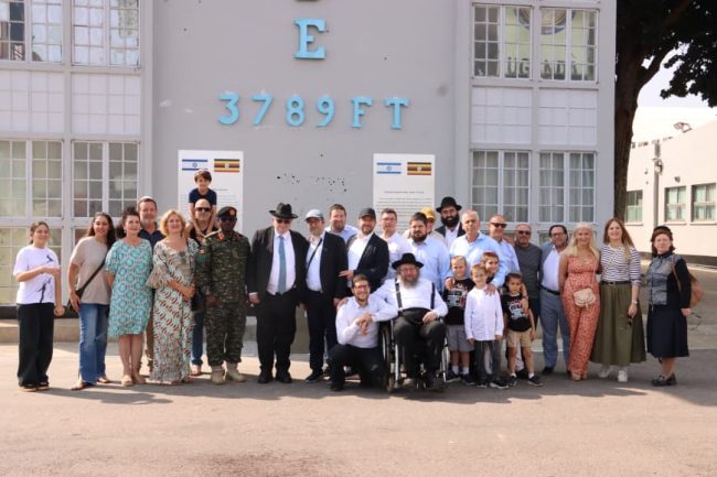 Col Chris Magezi in agroup photo with israel delegation at the memorial ground.JPG