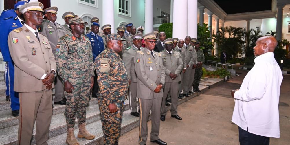 President Museveni talks to officers from the War College of Mali after giving them an opportunity lecture at State House Entebbe on Thursday. PPU Photo..jpg