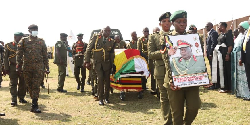The casket containing the body of Gen (Rtd) Moses Ali arriving at Adjumani district grounds for the final prayers..JPG