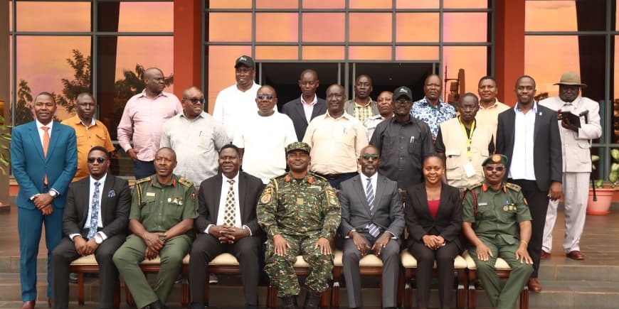 A group photo of the retirees with the training facilitators.JPG