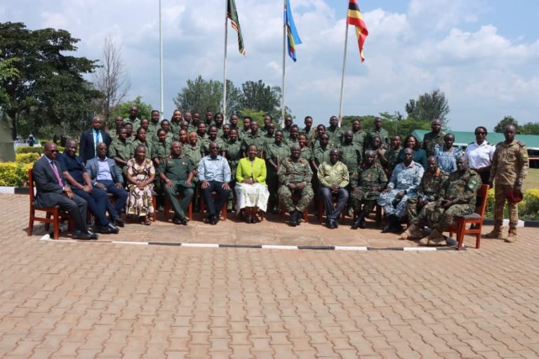 Chief Guest , UPDF General officers, URA Team sharing a group with Graduands.JPG