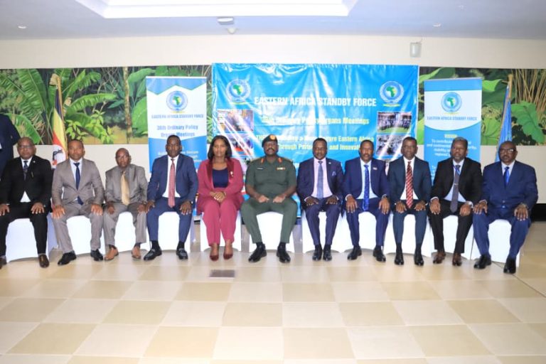 HON GRACE NGABIRANO AKIFEZA MINISTER OF STATE FOR DEFENCE UGANDA, GEN MUHOOZI KAINERUGA CDF, BRIG GEN RONALD RWIVANGA DIRECTOR EASF IN A GROUP PHOTO WITH 36TH POLICY ORGANS DELEGATES.JPG