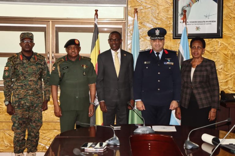 Hon Kiryowa Kiwanuka (C) Col AhMED Harb ( 2Right) with other ModVA Officials..JPG