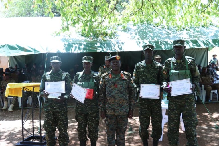 overall best students with the out going division commander.JPG
