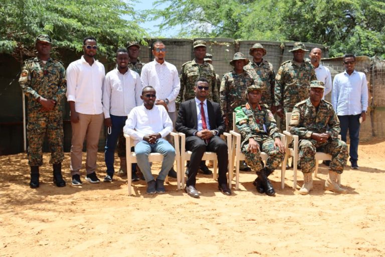 Group photo with H.E Mr. Osman amd Col Justus.JPG
