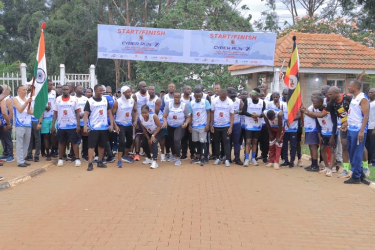 Air Commodore K.R.Thaakour Commandant National Foresnic Sciencies University India(Uganda) Campus Flagging off partcipants of Cyber Run at NSFC Jinja.JPG