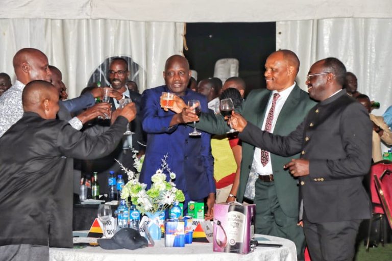 CAF Lt Gen Charles Okidi representing the CDF leads in a glass toast during the CDF dinner for the officee cadets at UMA Kabamba