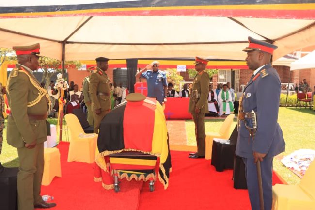 Lt. Gen Okidi Charles pays the last tribute to the Late Rtd Lt. Gen Oketcho g.JPG