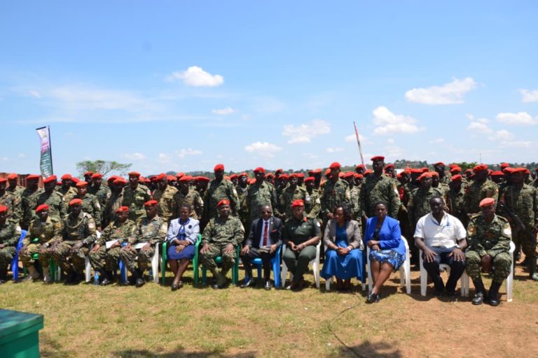 UNEB officials in a group photo with MP PLE participants at Buyala training school.JPG